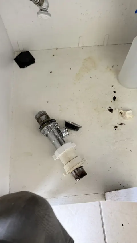 Old corroded sink drain parts removed, Orlando FL drain cleaning