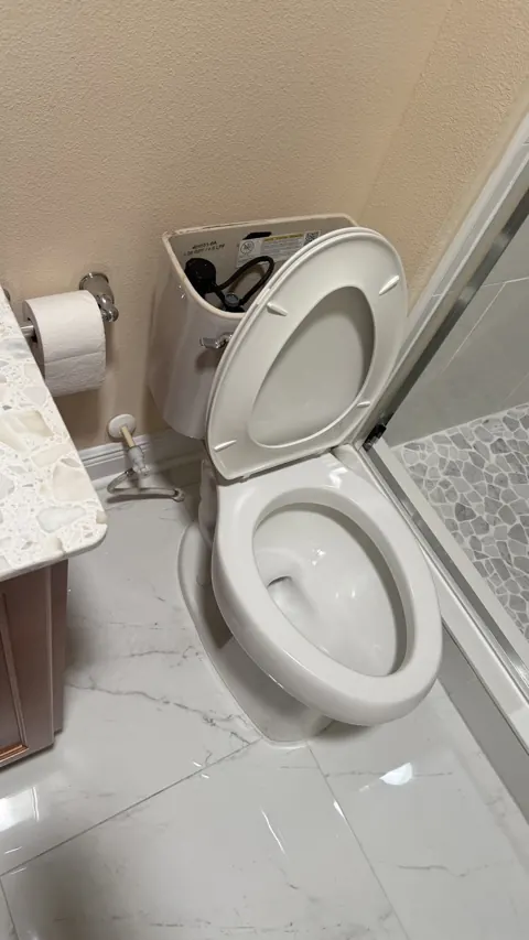 Toilet reset after drain cleaning by AZUR Overhauling in Orlando, FL